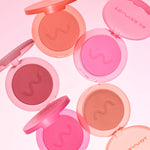 Five open Tower 28 Beauty GetSet Powder Blush compacts are arranged, showcasing a mix of bright, warm, and deep shades. [Malibu Cooler, Feliz Fresca, Culver Crush, Long Beach Iced Tea, Samo Spritzer, Sawtelle Slushie, Pali Punch]