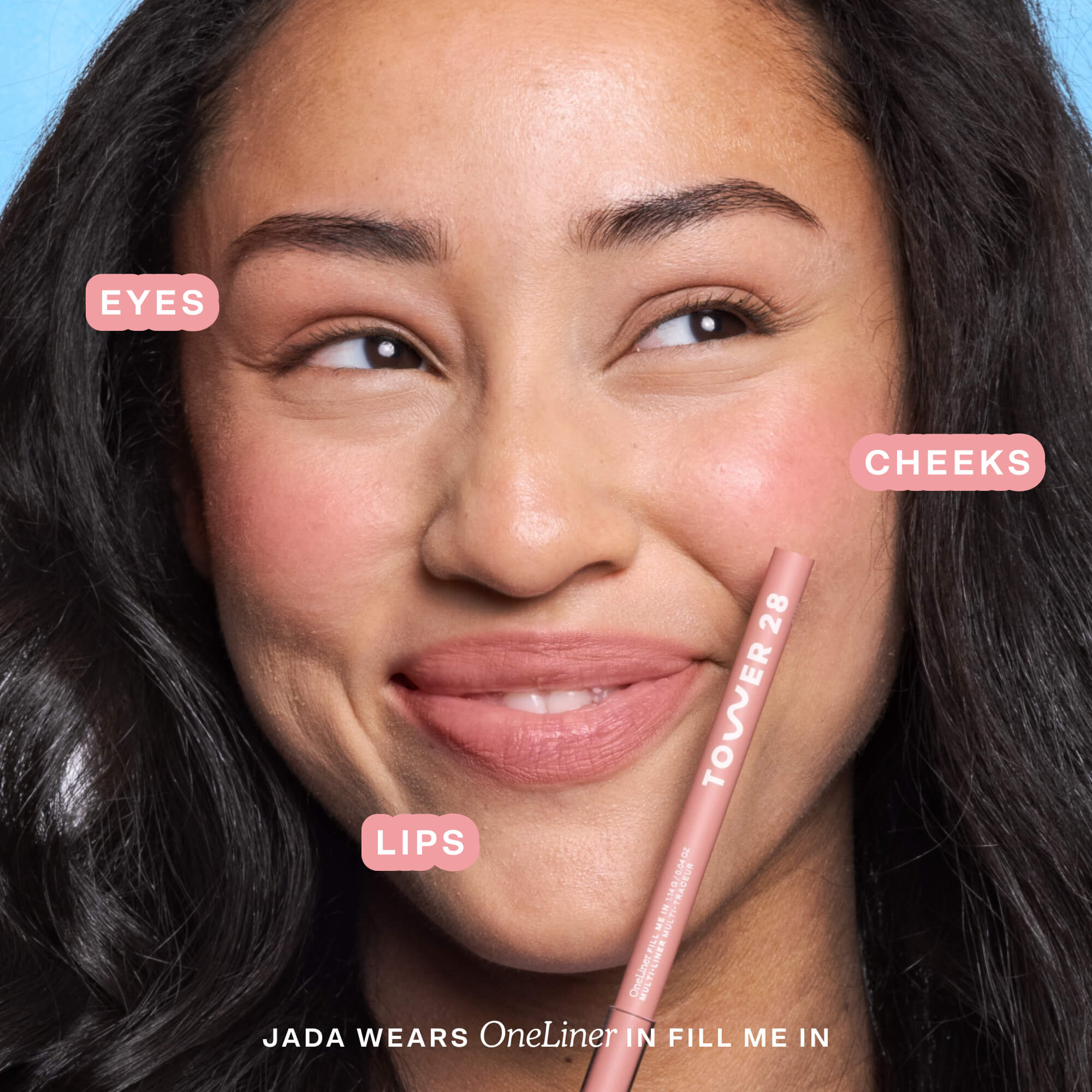A person wearing the Tower 28 Beauty OneLiner in the shade Fill Me In on her lips, cheeks, and eyes. [Fill Me In]