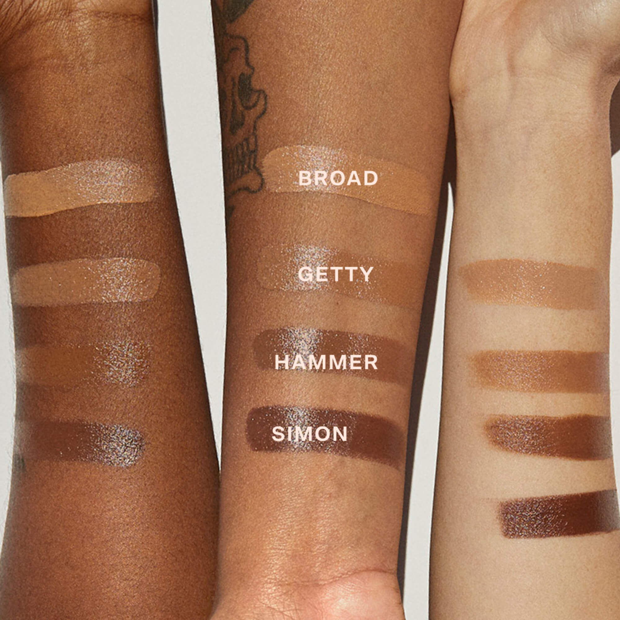 [Shared: All four shades of the Tower 28 Beauty Sculptino™ Cream Contour swatched on three different skin tones]