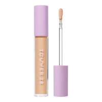 Tower 28 Beauty Swipe Serum Concealer in the shade 7.0 KTOWN, shown with the tube standing upright next to the open applicator wand to reveal the product. [7.0 KTOWN]