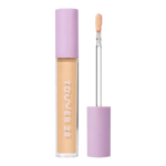 Tower 28 Beauty Swipe Serum Concealer in the shade 8.0 LBC, shown with the tube standing upright next to the open applicator wand to display the product. [8.0 LBC]