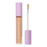 Tower 28 Beauty Swipe Serum Concealer in shade 10.0 NOHO, with the tube standing upright next to the open applicator wand, revealing the product. [10.0 NOHO]