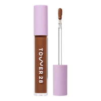 Tower 28 Beauty Swipe Serum Concealer in the shade 17.0 SD, shown with the tube standing upright next to the open applicator wand to reveal the product. [17.0 SD]