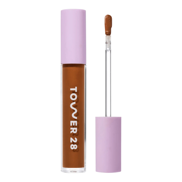 Tower 28 Beauty Swipe Serum Concealer in the shade 18.0 SGV, shown with the tube standing upright next to the open applicator wand to reveal the product. [18.0 SGV]