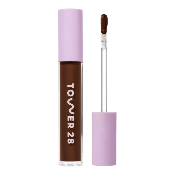 Tower 28 Beauty Swipe Serum Concealer in the shade 20.0 WLA, shown with the tube standing upright next to the open applicator wand to reveal the product. [20.0 WLA]